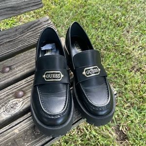 Black Guess Loafers with gold embellishment
